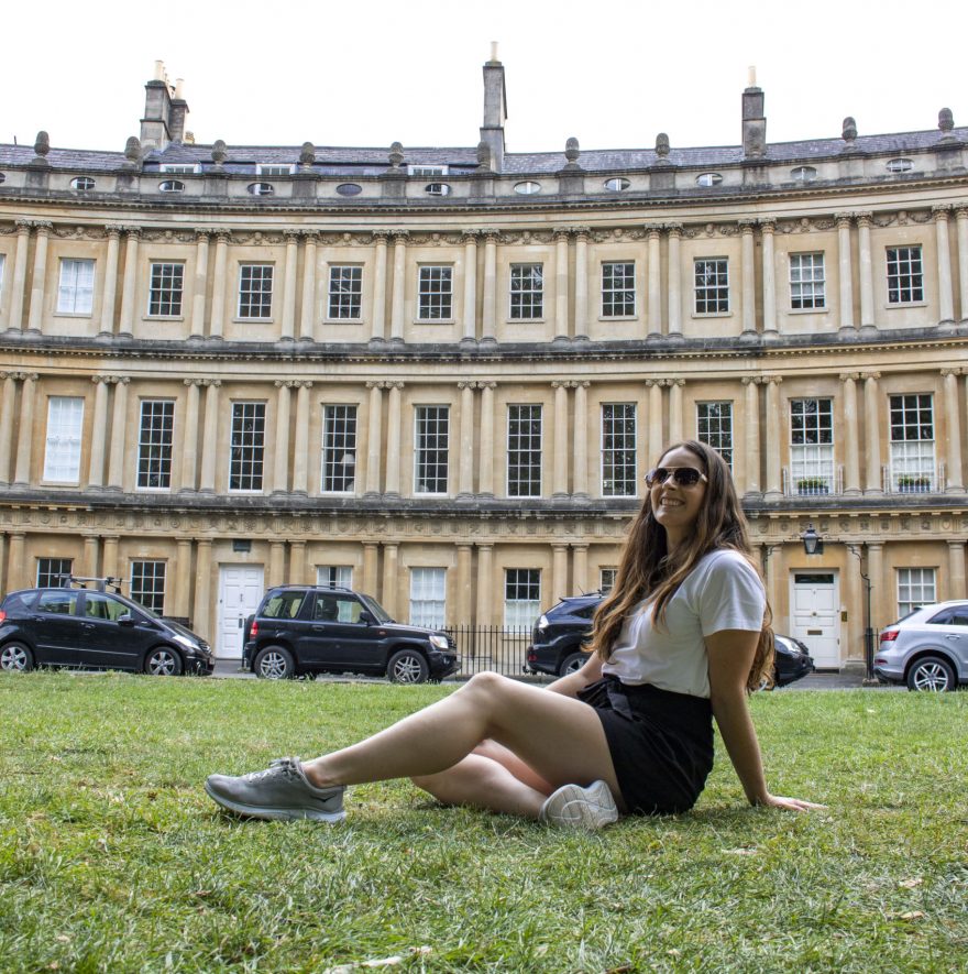 Picture of Katy sitting in front of building in Bath, England
